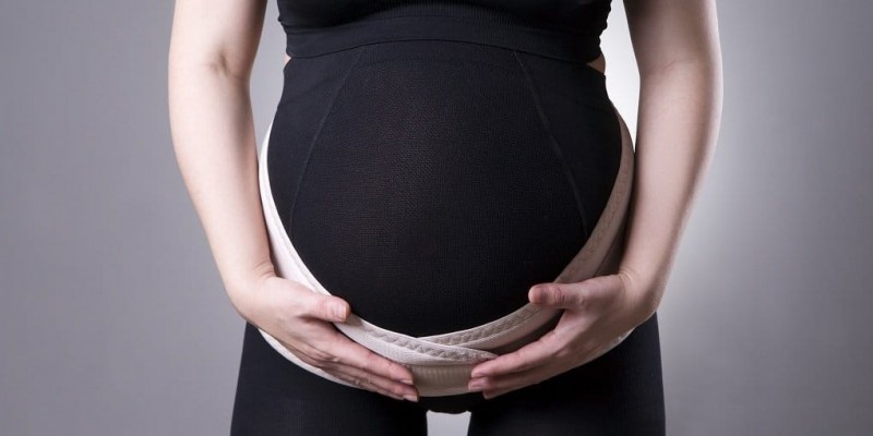 b2ap3 large Pregnant Woman Wearing a Maternity Belt 1534578669 84101