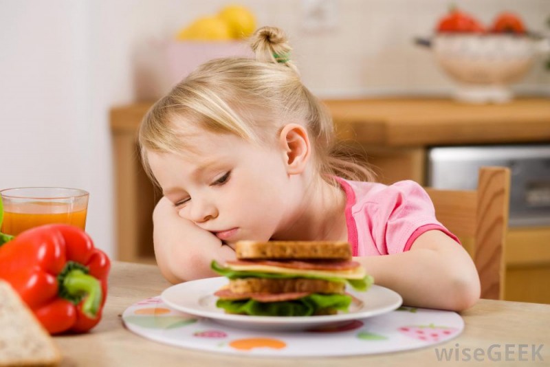 b2ap3 large girl at table near sandwich not eating 1533294265 36986