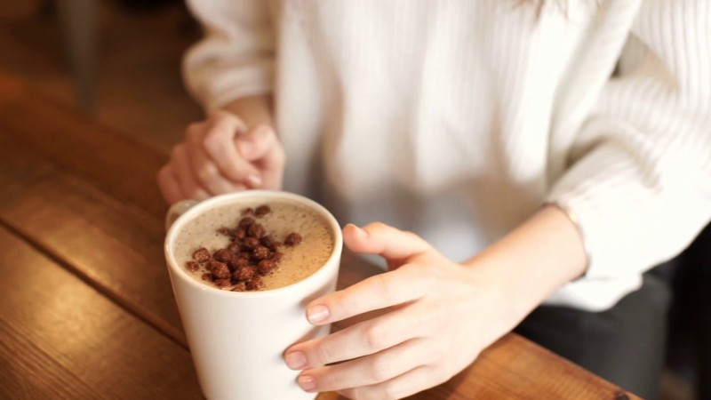 b2ap3 large girls hand taking a coffee from a table in cafe young lady drinking coffee in the morning happy girl drinking coffee and relaxing in cafe hywblazfg thumbnail full01