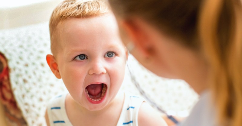 b2ap3 large Little boy opening mouth during examination 1200x628 facebook